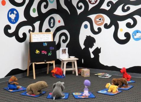 stuffed animals attending storytime