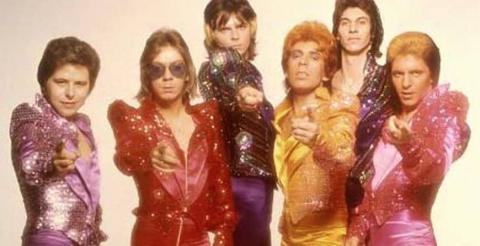 Image of Various Performers in Glam Rock Outfits