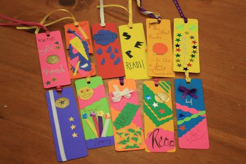 An assortment of homemade construction paper bookmarks.