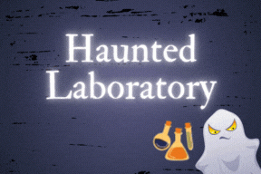 Text reads Haunted Laboratory. An angry ghost sits in the bottom right corner with three floating beakers and test tubes.