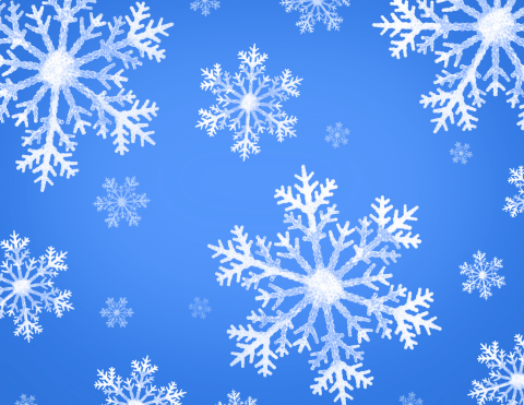 Snowflakes falling on a blue background