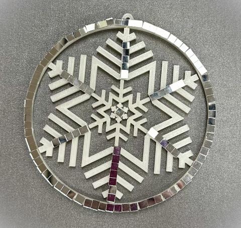 Snowflake with disco mirror stickers.