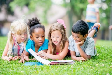 children reading a book