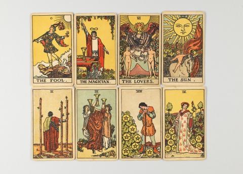 Different tarot cards in horizontal rows. 