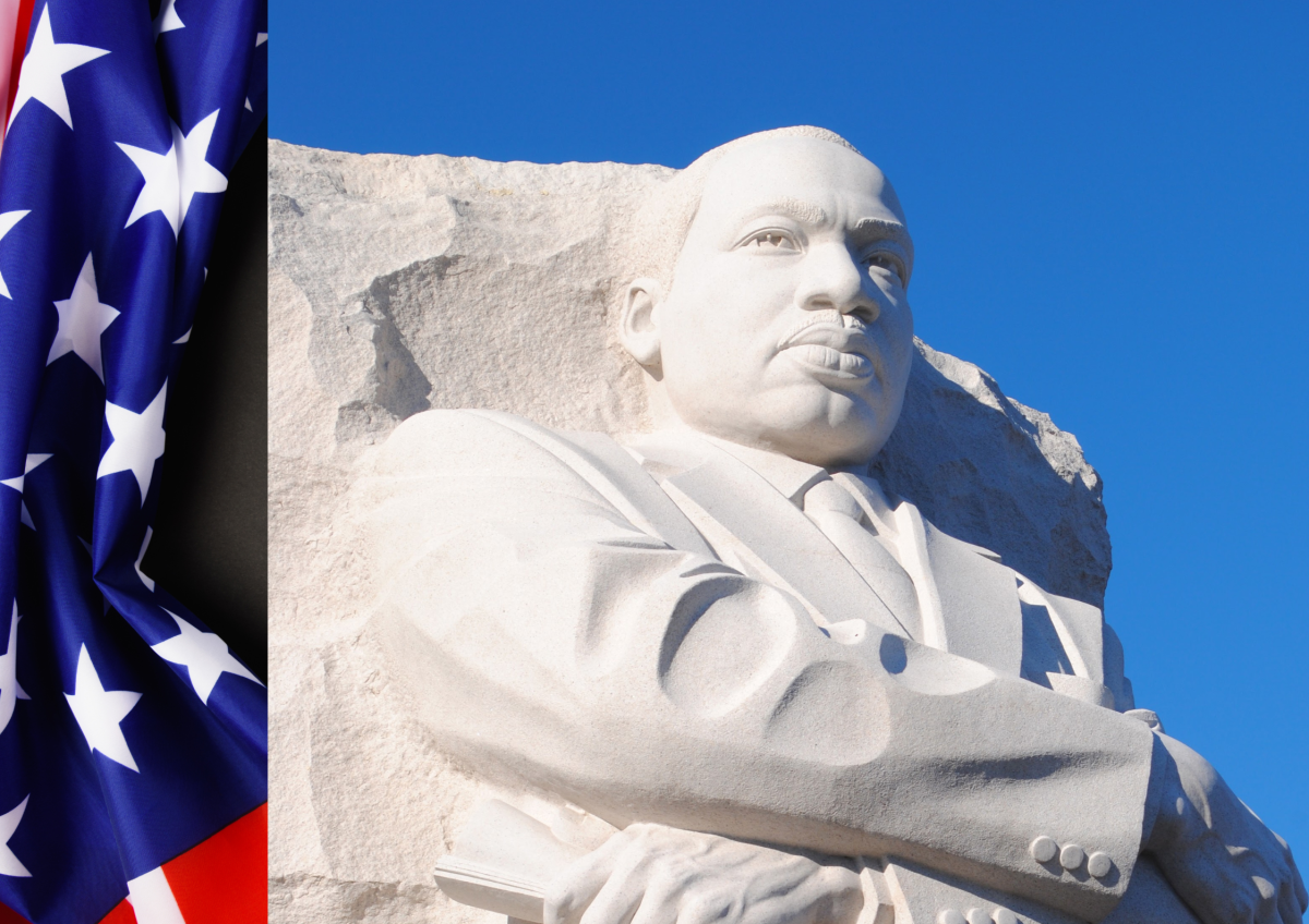 United States flag and Statue of Martin Luther King Jr. 