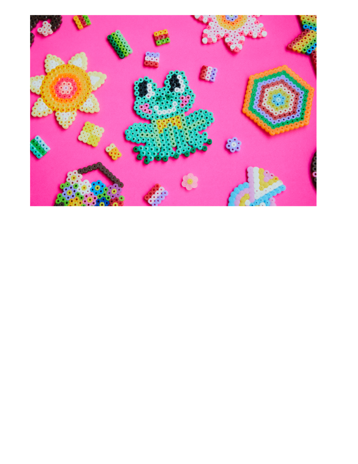 colorful pearler bead designs on a pink background